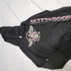 Black coat with Betty Boop drawings on a motorcycle and pink letters. With front